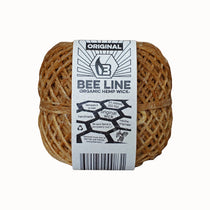 Ball of Bee Line organic hemp wick with label on a white background