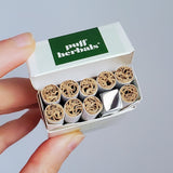 Tsubota Pearl Silver Queue Lighter in a Puff Herbals Cigarette Pack