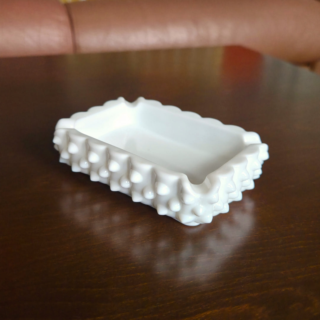 White textured rectangular dish on a wooden surface