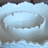 Close-up of a white ceramic bowl with textured rim