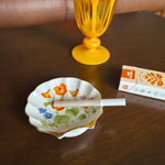 shell ashtray and herbal cigarette